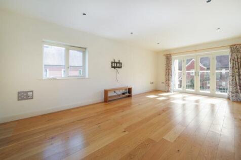 Living/dining room with balcony access