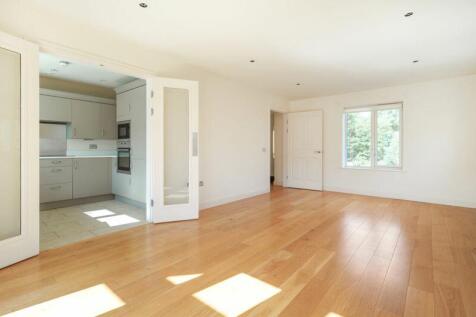 Living/dining room through to kitchen