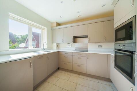 Kitchen with built-in appliances