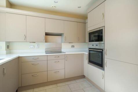 Kitchen with built-in appliances