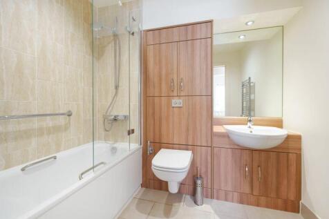 Bathroom with over-bath shower