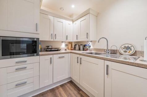 Kitchen with built-in appliances
