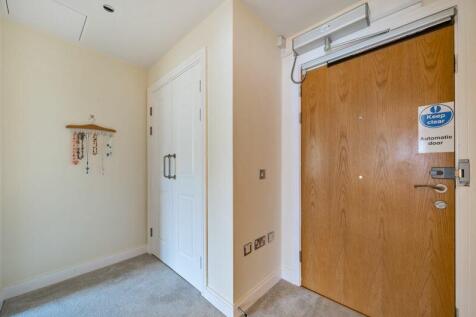 Entrance hall with storage cupboard