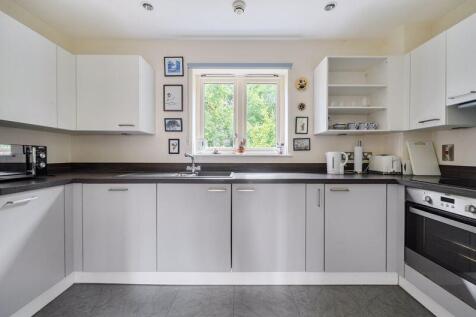 Kitchen with built-in appliances