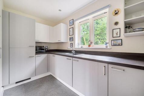 Kitchen with built-in appliances