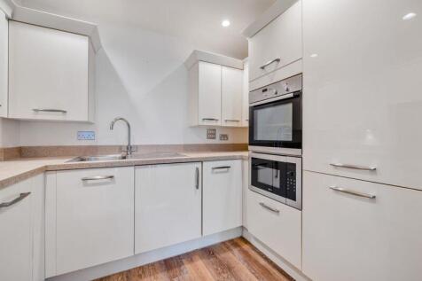 Kitchen with built-in appliances