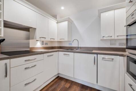 Kitchen with built-in appliances