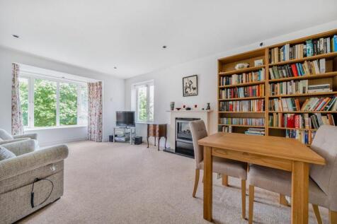 Living/dining room with bay window