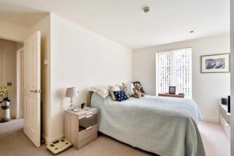 Master bedroom leading through to hal...