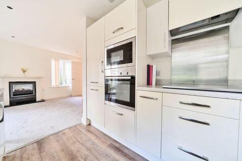 Kitchen with built-in appliances