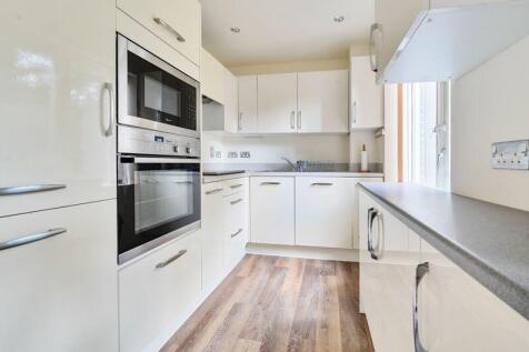 Kitchen with built-in appliances