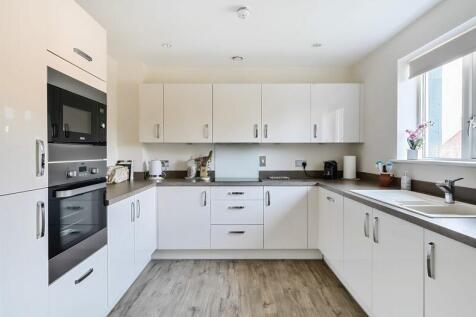 Kitchen with built-in appliances