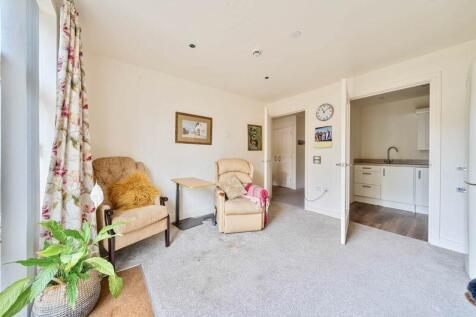 Living/dining room through to kitchen