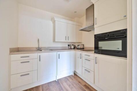 Kitchen with built-in appliances
