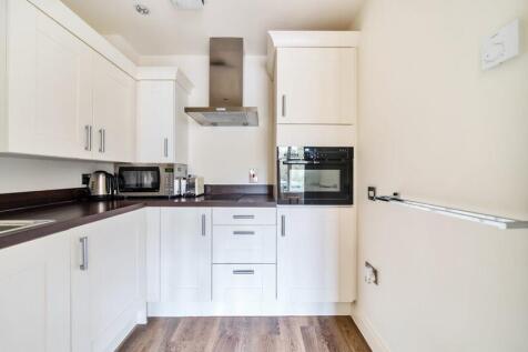 Kitchen with built-in appliances