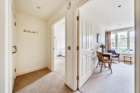 Hallway with storage cupboard