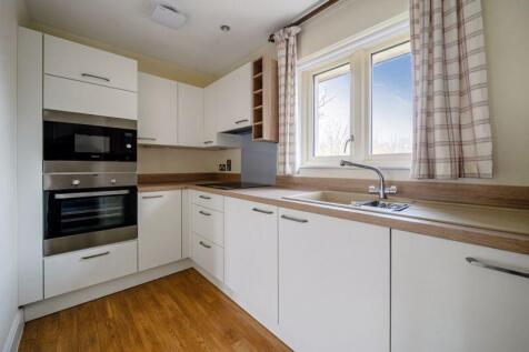 Kitchen with built-in appliances
