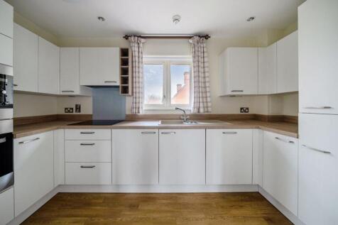 Kitchen with built-in appliances