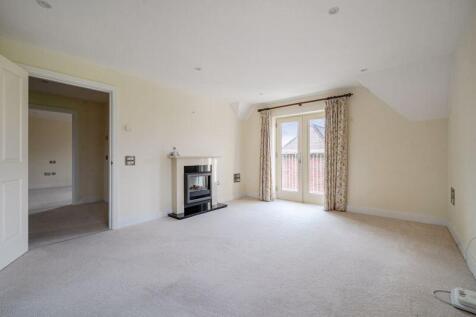 Living/dining room through to balcony