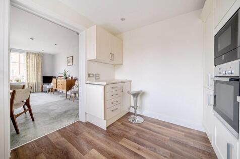Living/dining room through to kitchen