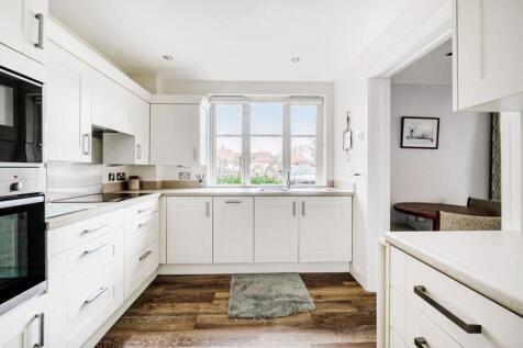 Kitchen with built-in appliances