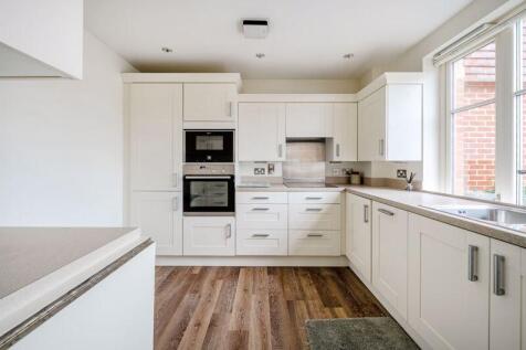 Kitchen with built-in appliances