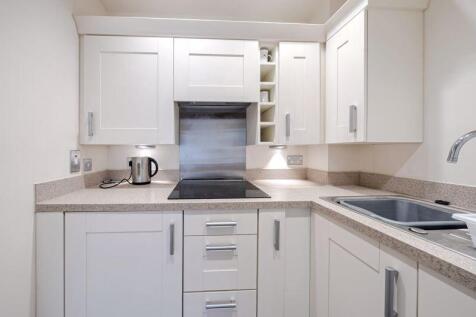 Kitchen with built-in appliances