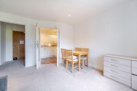 Living/dining room through to kitchen