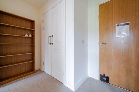 Entrance hall with storage cupboard