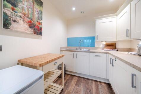 Kitchen with built-in appliances