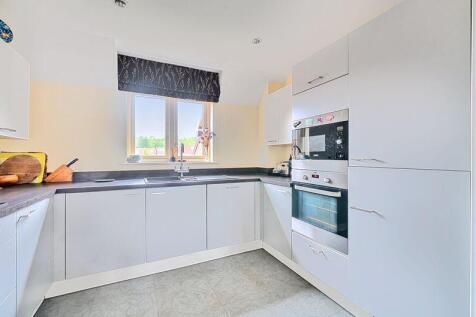 Kitchen with built-in appliances