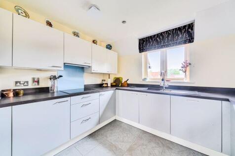Kitchen with built-in appliances