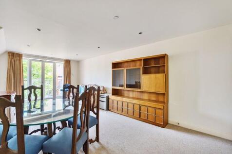 Living/dining room with balcony access