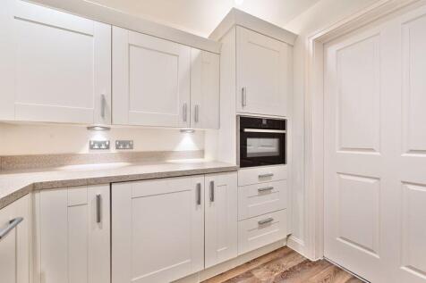 Kitchen with built-in appliances