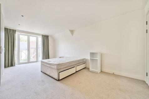 Bedroom with fitted wardrobes and ens...