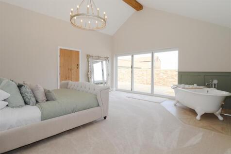 The Bungalow - A Bed 1.jpg