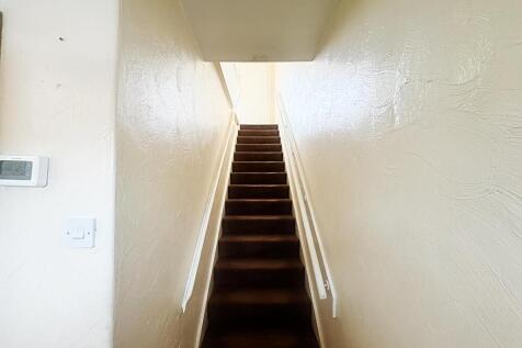 Stairs to first floor and Landing