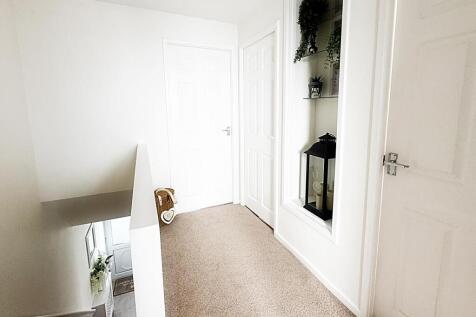 Stairs to first floor and landing