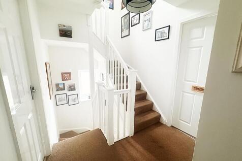 Landing and stairs to second floor