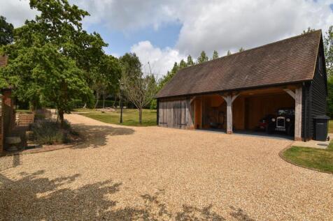 Triple garage &amp; driveway