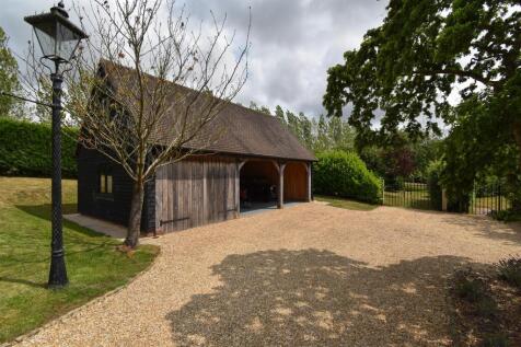 Triple garage &amp; driveway