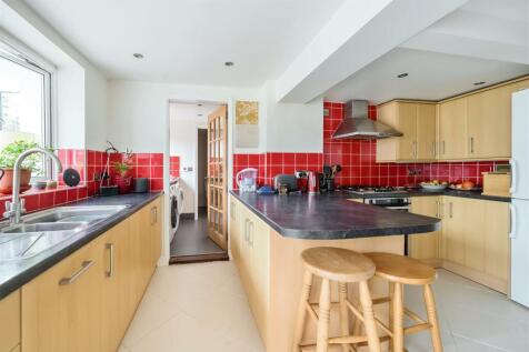 Kitchen through to Utility