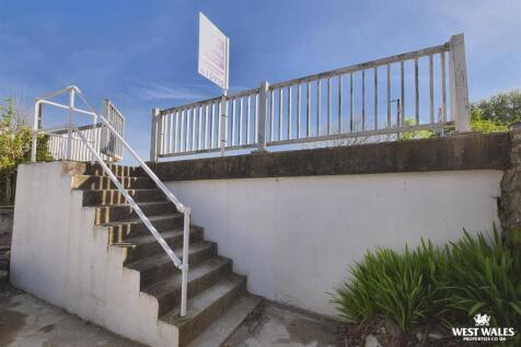 Steps up to Road