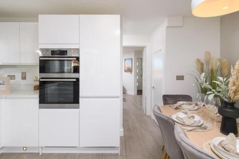 Leading through into the rear kitchen