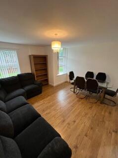 Spacious reception room with plenty of natural light