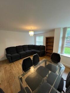 Spacious reception room with plenty of natural light