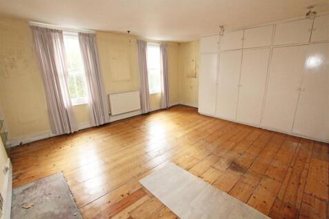 IMG_6681 bed yellow wardrobes.jpg