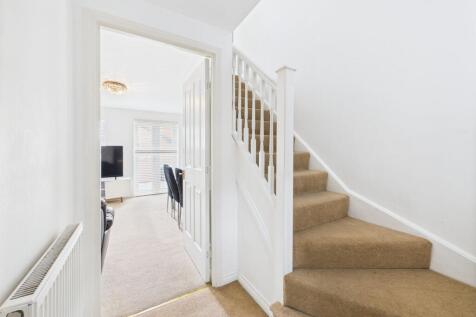 Entrance Hall through to Lounge