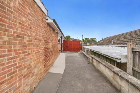 Side of Property with Parking