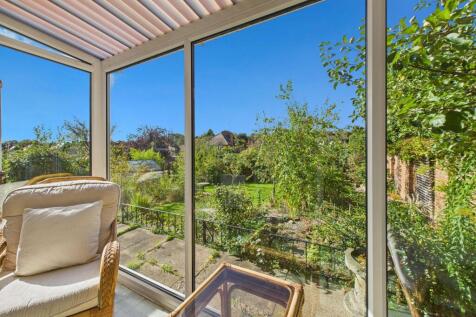 Conservatory with views onto Rear Garden